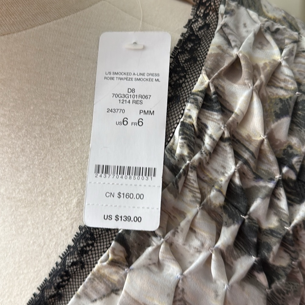 BEBE Dress with plenty smocking on shoulders , sleeves and yoke of the skirt. - Picture 8 of 9
